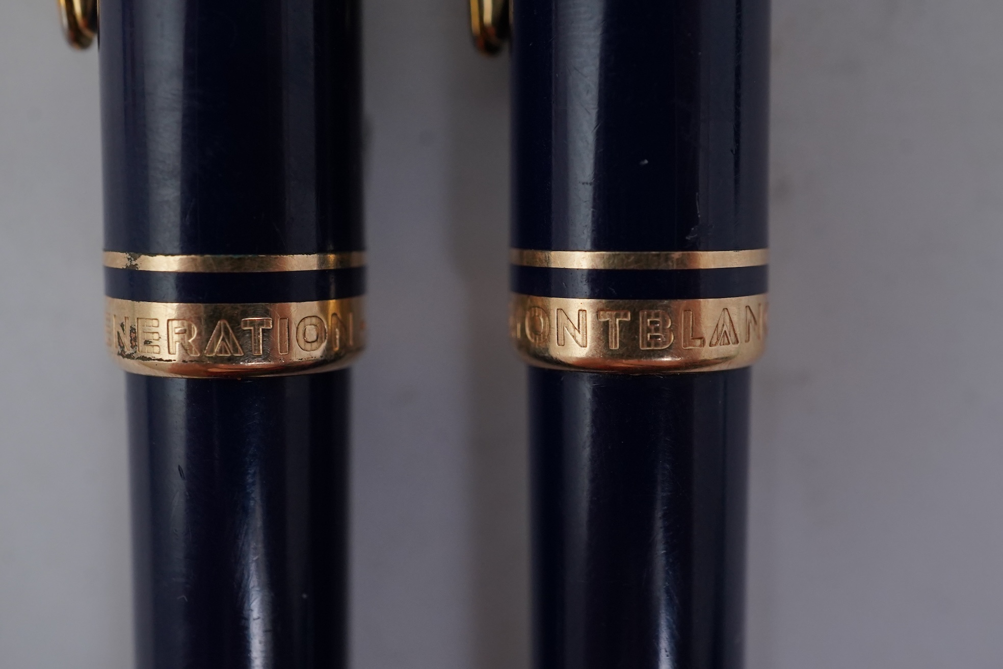 A Montblanc Generation ballpoint pen and propelling pencil set in blue with gold trims